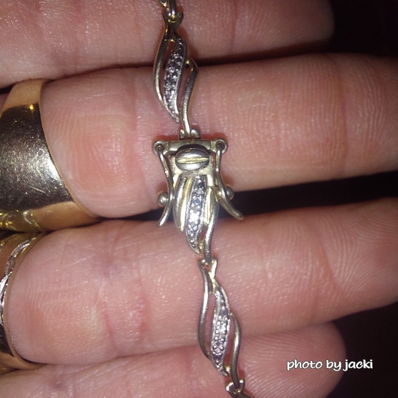 Gold over 925 Sterling Silver wave Bracelet accented w/diamonds - Picture 7 of 8